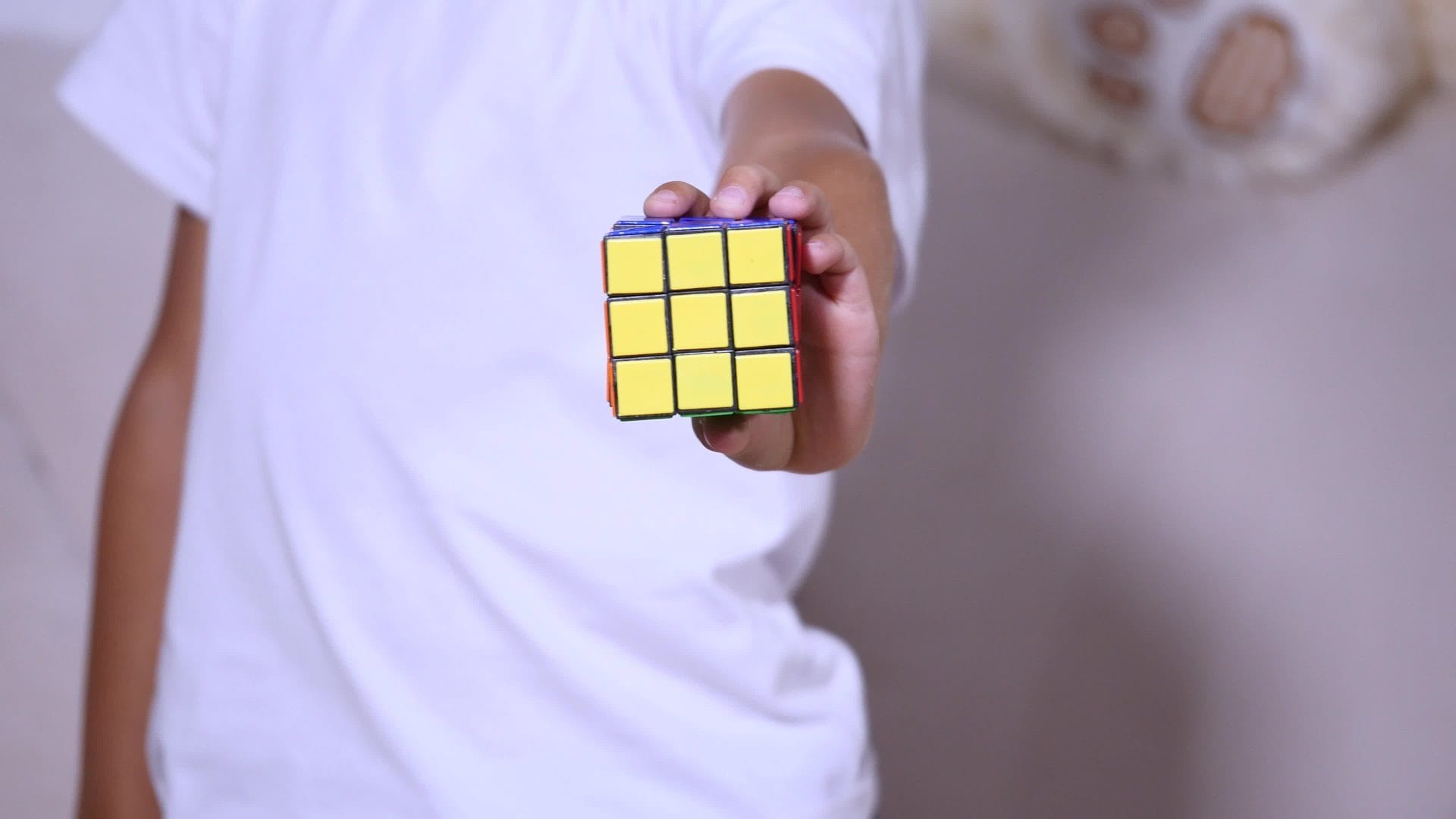 Mother and Child Solving Rubik's Cube