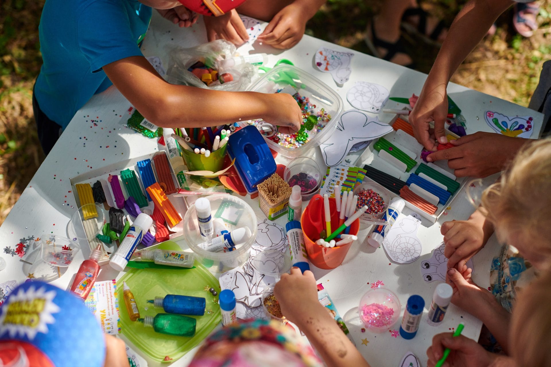 Kids engaged in creative arts and crafts at home